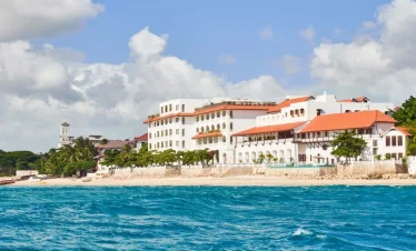 Private Roundtrip Transfers to Stone Twon City Attractions